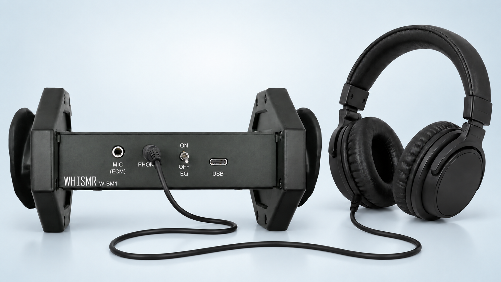 Headphones connected to the PHONES jack of W-BM1 for direct monitoring